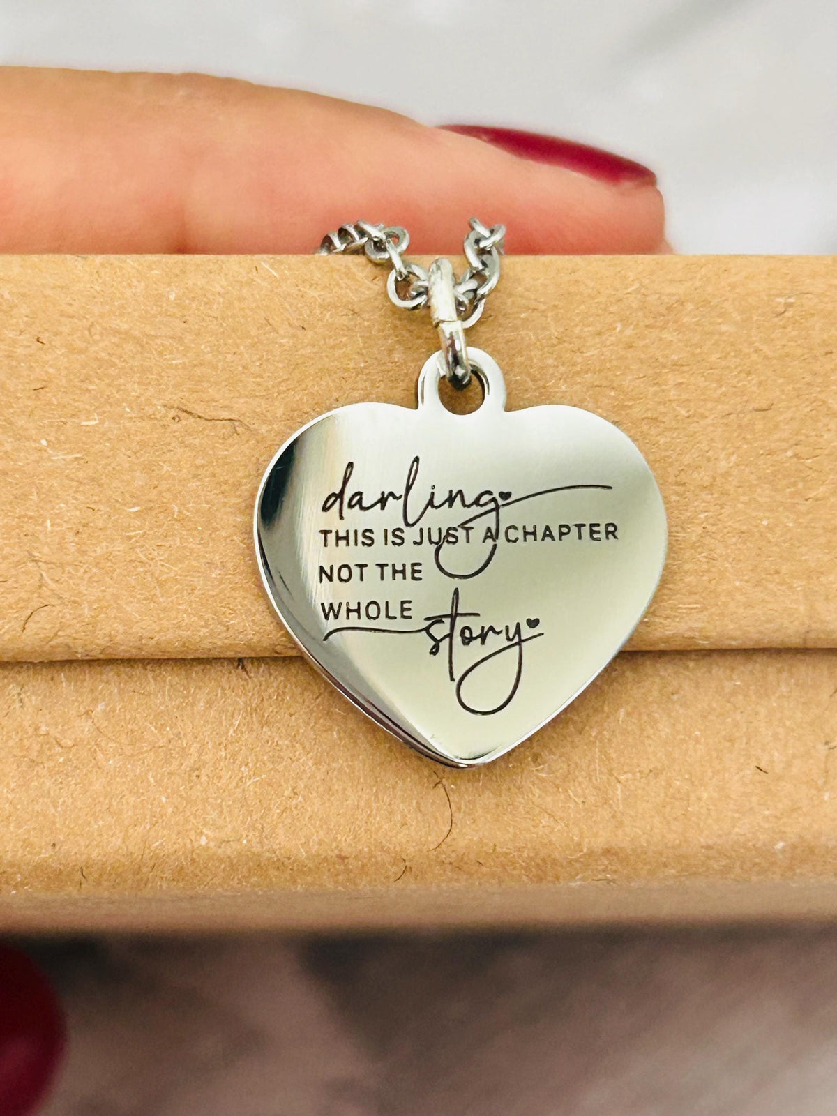 Motivational Stainless Steel Heart Necklace: 'Just A Chapter' Engraved Pendant