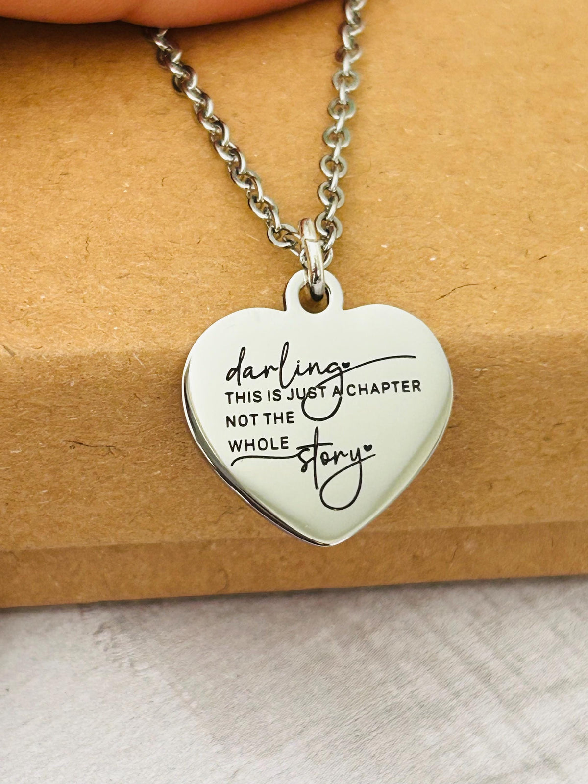 Motivational Stainless Steel Heart Necklace: 'Just A Chapter' Engraved Pendant