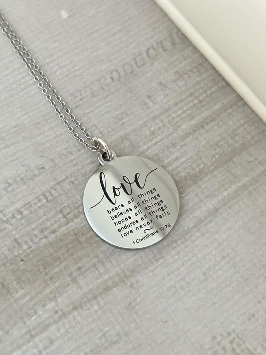 Love Never Fails Necklace: Christian Scripture Stainless Steel Pendant