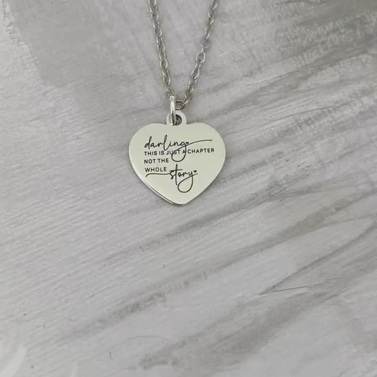 Motivational Stainless Steel Heart Necklace: 'Just A Chapter' Engraved Pendant