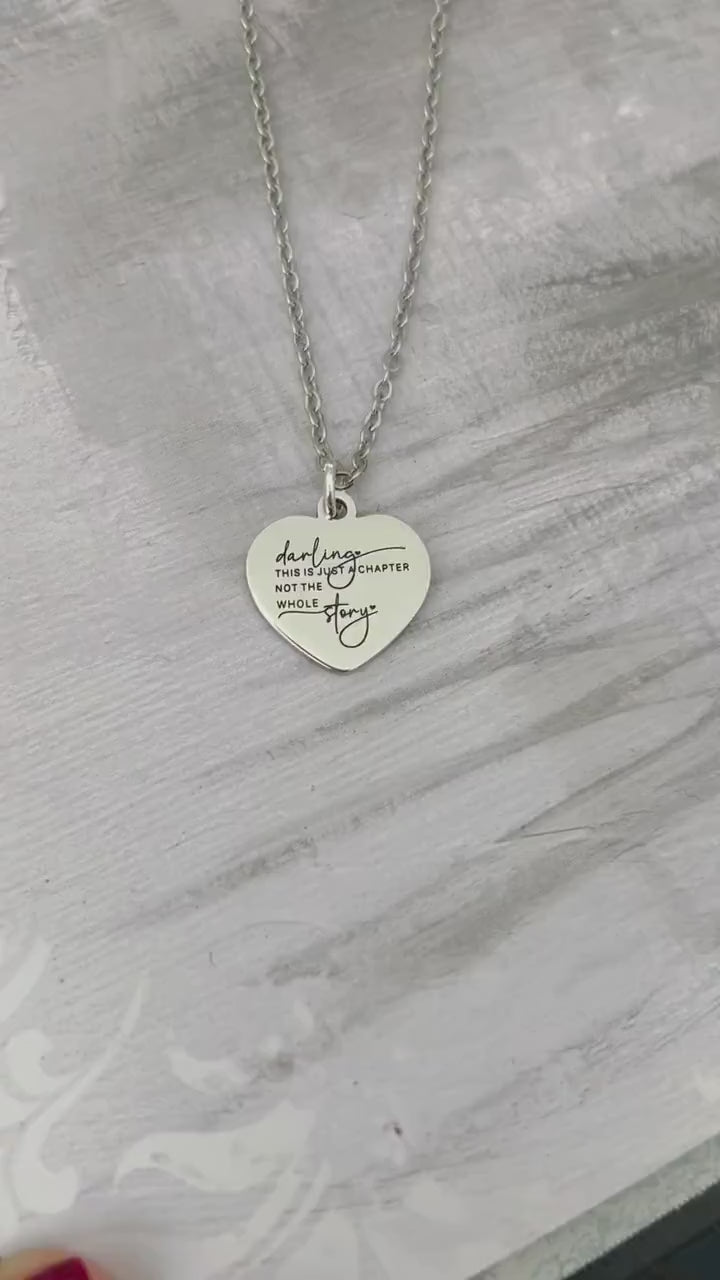 Motivational Stainless Steel Heart Necklace: 'Just A Chapter' Engraved Pendant